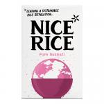 A photo shows six identical 1 kg Nice Rice Pure Basmati bags arranged in two neat rows. Each bag displays the Nice Rice logo and 'Pure Basmati' label, a clear window revealing long slender white grains, simple rice-stalk graphics, and clean packaging details. Soft light reveals fine grain textures.