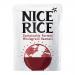 Front-facing beige bag of Nice Rice wholegrain basmati sits on a plain background. Green-and-white packaging displays the Nice Rice logo, a clear window revealing long brown grains, stylized rice-stalk graphics and small nutritional text at the side. Back shows a barcode and ingredient list panel. .