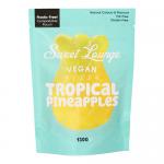 A vibrant yellow pouch displays bright sliced pineapples and green leaves on a turquoise background. White bubble motifs suggest fizzy texture. Bold 'Sweet Lounge' and 'Vegan' labels appear above colorful candy illustrations and a clear weight statement near the base. A glossy finish and resealable.