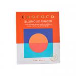 Photograph shows a deep, glossy 72% Ecuador dark chocolate bar broken into squares, revealing amber shards of crystallised ginger scattered across the surface. A minimalist wrapper with Chococo branding sits nearby, its rich brown tones complementing the chocolate Soft highlights catch light subtly