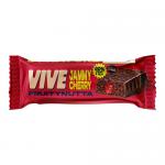 A colorful rectangular box with a single wrapped bar in front sits on a neutral background. Bright cherry-red and deep maroon colors dominate, featuring glossy cherry illustrations, scattered nut motifs and bold white brand lettering. The compact package appears modern and snack-sized. Slight edges.