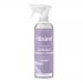 A photo shows six 750ml Miniml Anti-Bac Surface Cleaner bottles arranged in two rows of three on a white background. Each clear bottle contains pale lavender liquid, sports a simple white label with minimalist logo and lavender illustration, and features a white trigger spray cap. Soft shadows show.