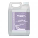 Two matte white 5L jugs of Miniml anti-bac surface cleaner stand side by side on a neutral surface. Each jug features a minimalist label with soft purple accents and a small lavender illustration, integrated handle and screw cap, casting a gentle shadow against the plain background. Soft highlights.