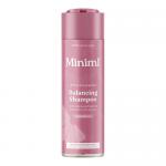 Six tall translucent bottles of pale pink shampoo stand in a neat row against a white background. Each 500ml bottle features minimalist white labels with subtle grapefruit illustrations and aloe leaves, matte silver caps, and a clean, modern lifestyle aesthetic. Soft shadows lift edges subtle sheen.