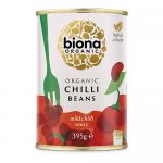 A single metal can of Biona Organic Chilli Beans fills the frame, its bright red label featuring the Biona logo, stylized chili and kidney bean imagery and white text. The metal rim and pull-tab gleam, while photograph lighting highlights label texture and canned contents illustration in vivid color.