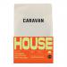 A photo shows six 200g bags of Caravan Coffee Roasters House Ground arranged in two rows. Each matte kraft-style pouch displays the Caravan Coffee Roasters logo and clear label text, simple graphic accents, and a sealed top, set on a neutral backdrop.