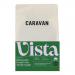 Six 200g Caravan Coffee Roasters bags sit in a neat group on a white background. Each matte pouch shows a minimalist label with the Caravan logo and 'Vista' name in muted earth tones and a resealable zip. A small pile of dark roasted beans rests in front.