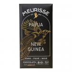A photographed 100g Meurisse dark chocolate bar from Papua New Guinea sits on a neutral background. The unwrapped bar shows rich, glossy deep-brown squares with crisp edges; the wrapper features bold typography, subtle cocoa-harvest imagery and tropical accent colors. Soft sheen, cocoa dusting closer.