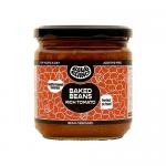 Twelve glossy 325g cans of Bold Bean Rich Tomato Baked Beans sit in an open cardboard tray, arranged in three rows of four. Red labels feature a bold white logo and a photographic bowl of beans in tomato sauce; nutritional panels and can tops are visible Shiny can rims and pull-tabs reflect light