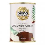 The photo shows six identical 400 ml Biona Organic Coconut Cream cans arranged in two rows. Each white-and-green label features a whole coconut and palm leaves, the Biona logo, and product name. The cans sit against a plain white background.