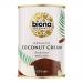 The photo shows six identical 400 ml Biona Organic Coconut Cream cans arranged in two rows. Each white-and-green label features a whole coconut and palm leaves, the Biona logo, and product name. The cans sit against a plain white background.