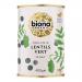 Photo shows six green-lentil packs standing and stacked; each 400g bag displays Biona branding, botanical graphics and clear window revealing small round green lentils. Background is neutral, lighting highlights texture and earthy green tones; packaging labels and text are legible. fine grain texture