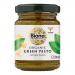 Six 120g glass jars of Biona Organic Green Pesto sit together in a neat pack. The jars display green-and-white labels with the Biona logo; vivid green pesto shows through clear glass and metallic lids, and the jars are held together by a compact retail wrap.