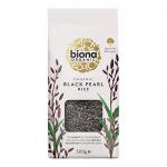 Image shows six 500g packs of Biona Organic Black Pearl rice arranged in two rows of three. Each matte black and cream bag features a clear window revealing glossy dark grains, a green organic logo, product name in bold, nutrition text and bar code on the rear, set against a neutral background. Studio.