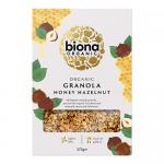 Image shows six 375g Biona Organic Honey Hazelnut Granola packs with natural kraft-style packaging and a green Biona logo. Each pouch displays a bowl of golden granola, scattered hazelnuts and a honey drizzle illustration, plus clear product name and weight text.