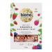A row of six cardboard boxes shows Biona Wild Berry Crisp Granola. Purple and cream packaging features glossy berry photography and granola clusters spilling from a wooden bowl, with the Biona logo, organic badge and ingredient illustrations arranged across the front panels. Matte finish; crisp font
