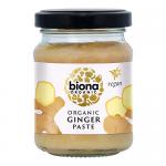 The image shows six identical glass jars arranged in two rows of three, each with a green screw cap and white-and-green label. Transparent glass reveals pale tan ginger paste; labels display the Biona logo and a ginger-root illustration.