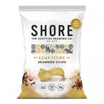 A glossy Shore Asian Peking seaweed chips pack rests on a neutral surface. The green-and-red packet displays stylized seaweed illustrations, Peking-inspired typography and an 80g mark. Dark-green, crispy seaweed sheets are visible through a small clear window.