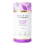 Photograph shows twelve 150g Sleep Easy Grape sachets by Jade & Joy Superfoods arranged in three neat rows Each glossy purple sachet features clustered grape imagery the Jade & Joy Lifestyle logo clean white text a small ingredient panel, resealable top and soft studio lighting with gentle shadows.