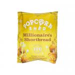 Photo shows a compact 24g Popcorn Shed Millionaire Shortbread snack pack with glossy caramel and shortbread imagery, warm golden-brown tones, clear brand logo and neat typography. Sixteen identical packs arrange in a grid, casting soft shadows on a neutral background. Edges crinkle subtly, revealing.