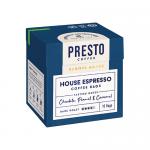 A neat arrangement of twelve slender 80g coffee bags from Presto Coffee Roasters sits on a plain surface. Each matte pouch features a warm brown palette, centered Presto logo, minimalist text and a small roast emblem. Soft studio lighting creates subtle highlights and shadows. A paper tag hangs on.
