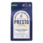 Six matte-black bags of Presto Coffee Roasters House Espresso ground coffee stand in two neat rows against a neutral backdrop. Each 200g pouch displays a minimalist white logo and label, a resealable top, and a subtle brown coffee-bean graphic near the base. Soft studio lighting creates soft shadows