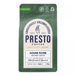 Six compact 200g matte black bags stand in two rows, each labeled Presto Coffee Roasters House Filter Ground Coffee in white serif text. A subtle coffee-bean illustration and gold accents frame a central logo. Clean white background, soft shadows, resealable tops visible. Warm tone highlights grain.