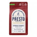 A row of six Presto Coffee Roasters Espresso Intenso 200g bags sits on a shelf. Matte black packaging features bold white and copper lettering, a minimalist logo and roast details. Uniform bags angle slightly, casting soft shadows against a neutral grocery aisle background. Fine print near the base.