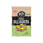 A bright, glossy bag displays an assortment of licorice: layered squares, cylindrical bites and round discs in black, pink, white, yellow and orange. Many pieces show sugary coatings, stripes and fillings. A bold brand logo sits atop the vivid packaging. A small clear window shows the sweets inside.