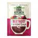 A brightly colored pouch displays Thai Beetroot & Coconut Soup branding over a vivid magenta-red beetroot background, with creamy coconut swirls and Thai herb illustrations. Nutritional icons, company logo and an ingredients panel appear alongside preparation symbols and a small product image. Shot.