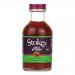 Six glass bottles of Stokes Chilli Ketchup sit upright in a neat row. Each 300g bottle displays a white label with the green Stokes logo, chili illustration and product text. The deep red sauce shows through clear glass, capped by cream-coloured screw lids. Soft gleams catch on glass, labels faintly