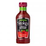 Ten red Squeezy bottles fill the image, each squeezable plastic bottle capped by a white flip-top. The Stokes logo and Real Tomato Ketchup label feature ripe tomato photography and clean typography. Glossy surfaces and studio highlights reflect across the pack.