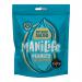 Photo shows several 25g ManiLife Deep Roasted Peanuts packets and an open ManiLife Fruit, Nuts & Seeds box. Dark, roasted peanuts spill from a torn sachet onto the table beside stacked pouches, with visible brand logos and clean, minimal packaging artwork.