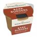 Bright cardboard box displays twelve small packets arranged in neat rows. Each packet shows a smiling cartoon bulldog in a monocle and top hat, vintage script reading 'Sir Woofchester', and illustrated burger-shaped treats. Background mixes rich burgundy, cream accents, and paw-print motifs.