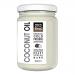 Six identical 500ml bottles of Cocofina Organic Virgin Coconut Oil stand in a neat group, each showing a white label with green accents and coconut imagery. Clear oil glows inside the transparent bottles. A plain white background and soft lighting emphasize the clean presentation. Subtle reflections