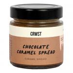 A neat display of six CRWST Chocolate Caramel Spread jars, each 210g, sits against a plain background. Glossy brown spread peeks through clear glass beneath a warm brown lid; labels feature stylized caramel drips, dark chocolate imagery and bold CRWST branding. Warm highlights accent labels' textures.