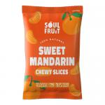 A clear pouch shows glossy, soft-dried mandarin slices in rich orange hues, their segmented, slightly translucent flesh and curled rinds visible. A simple label reading “Soul Fruit” sits atop a compact 25g pack, with small fruits arranged naturally against a white backdrop. and a faint sugar sheen.