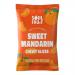 A clear pouch shows glossy, soft-dried mandarin slices in rich orange hues, their segmented, slightly translucent flesh and curled rinds visible. A simple label reading “Soul Fruit” sits atop a compact 25g pack, with small fruits arranged naturally against a white backdrop. and a faint sugar sheen.