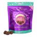Photo shows a compact box of Booja-Booja Salted Caramel Chocolate Wonders holding eight individually wrapped truffles. Dark brown and copper packaging contrasts with glossy round chocolates arranged in front, each topped with scattered flakes of sea salt.