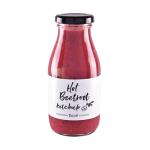 Six 285g Hawkshead Relish Hot Beetroot Ketchup bottles stand side by side, their deep magenta sauce visible through clear glass. Cream labels bear a black Hawkshead logo and red highlights; each bottle is sealed with a metal screw cap.