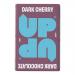 A cluster of ten UP-UP dark cherry chocolate bars sits in a rectangular pack. Deep burgundy wrappers show glossy chocolate squares and a sliced cherry image. The box features bold white UP-UP lettering, gold trim and a subtle sheen under studio lighting. Soft reflections catch subtle foil highlights