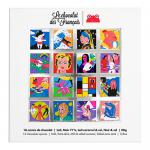 Image shows a neat arrangement of Le Chocolat des Français Art Square gift boxes, their colorful square wrappers displaying playful French illustrations. Gold foil highlights and glimpses of dark chocolate bars peek from open sleeves, all set on a crisp white surface in clean, modern styling. Subtle.