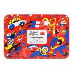 A small metal tin shows a retro French label with bold typography. Inside, milk chocolate-coated crispy rolled wafer sticks sit neatly, their glossy chocolate surface and delicate flaky layers visible at each end.