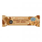 Photo shows a rectangular oat bar in bright wrapper branded Oatopia, with peanut butter imagery and scattered oat flakes. Packaging uses earthy tan and warm orange tones, clear product name typography, and a close-up of textured oat and peanut clusters visible through a window. Soft highlights glow.