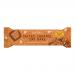 A 60g Oatopia Salted Caramel Oat Bake sits front and center in warm beige and caramel packaging, logo and salted-caramel graphics visible. Oat flakes and caramel drizzle appear on a partially unwrapped bar; several wrapped bars stack blurred in the background.
