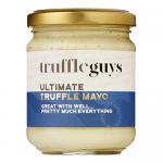 A cluster of six 190g glass jars of Truffle Guys Ultimate Truffle Mayo sits on a wood surface. Each jar shows a creamy, off-white mayo visible through clear glass, topped with a black lid and a black-and-gold festive label featuring truffle imagery and subtle holiday accents. Metallic sheen on lids.