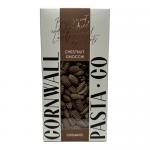 A 250g Cornwall Pasta Co packet labeled Organic Chestnut Gnocchi shows the brand logo and product name on warm, earthy packaging with seasonal Christmas motifs—subtle holly and snowflake graphics—and a clear window revealing small chestnut-coloured gnocchi shapes.