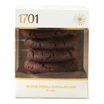A rectangular bakery box uses deep brown and cream tones. The front displays stacked double chocolate chip biscuits with glossy chocolate chunks and crumb texture in close-up. A stylized logo occupies a corner while ingredient and recycling icons line the side panel. Background shows cocoa accents..