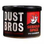 Brightly colored pouch featuring the Dust Bros logo in bold white letters across a dark red background. A stylized chili graphic and spice dust cloud decorate the front. Nutritional icons and a clear weight label appear near the bottom. Packs sit neatly in a rectangular cardboard case. Bright trims.