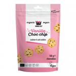 Packaging shows Kookie Cat Bakery branding with a playful cat logo. The front displays vanilla and chocolate chip mini cookies scattered on a pastel background, crumbs and glossy chocolate chips visible. Bold, rounded typography names the flavor and highlights the product weight. Subtle gloss finish
